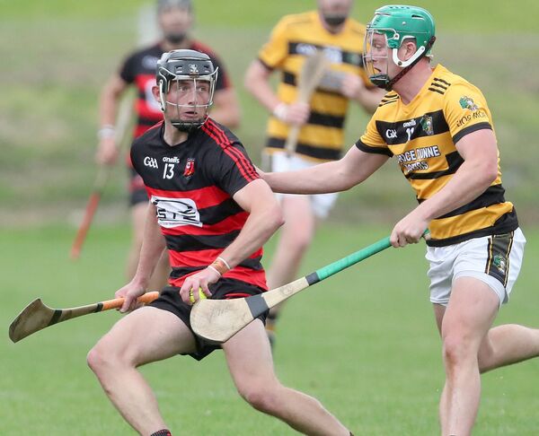 Ballygunner's Harry Ruddle in possession against Lismore's Jack Prendergast. 