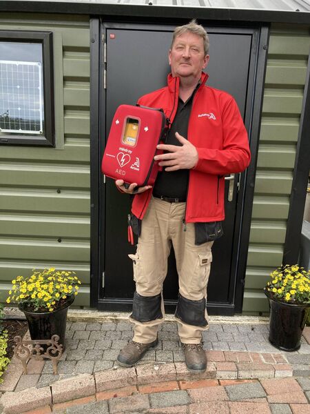Frank Deegan with the new defibrillator