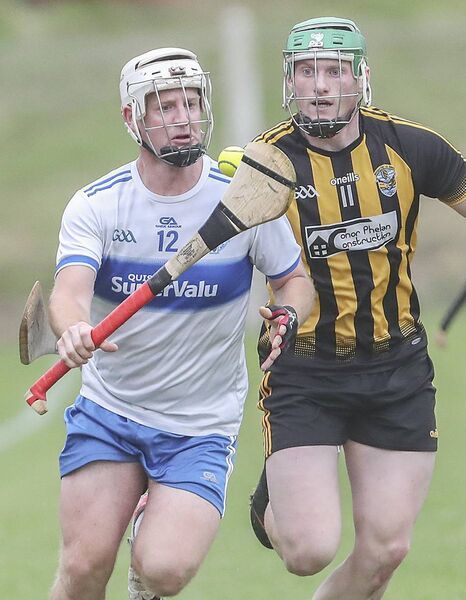Tramore's John Clancy controls the sliothar against Brickeys' Niall Browne.