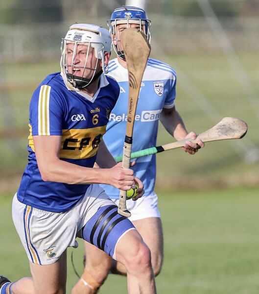 Tallow's Jordan Henley gets ahead of Roanmore's Conor Ryan last weekend. Next up are Roanmore's neighbours DLS. Photo: Sean Byrne.