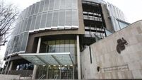 Masked raider with lighter poured flammable liquid in front of mother and baby, court told