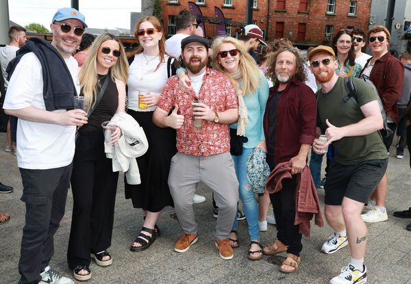  Enjoying the musice at the Apple Market, during the Spraoi Festival. Photo: Joe Evans