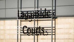 Three to appear in court after Belfast rioting Three to appear in court after Belfast rioting