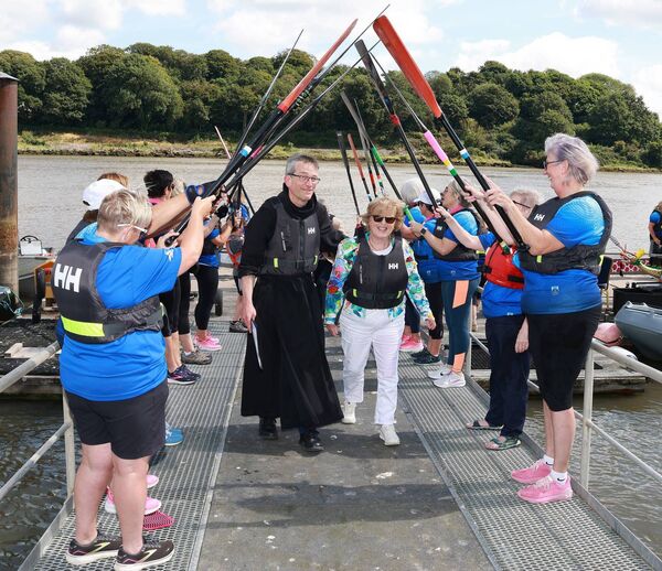 A guard of honour for guests at the launch of the Waterford Dragon Boat Club new boat "The Chantelle" which was kindly gifted to the club by the family of the late Dr. Chantelle Macnamara. Photo: Joe Evans