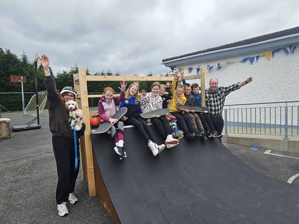 Students test the new skate ramp.