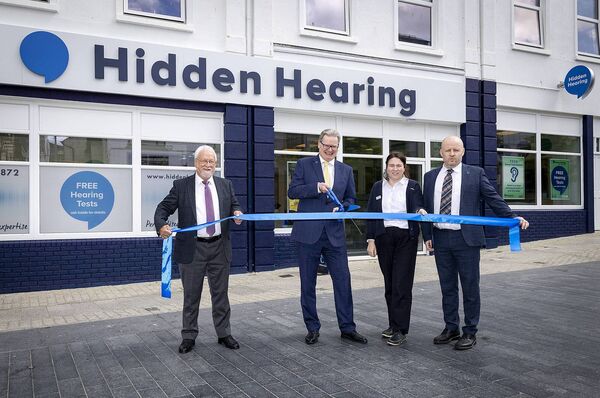 Robin Atkinson, long time client, Gavin Johnson, Hearing Aid Audiologist, Suzie Keating, Clinic Coordinator and Stephen Kelly, Hearing Aid Audiologist. 