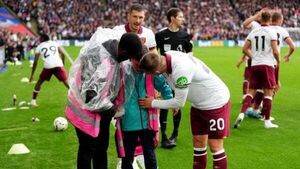 West Ham duo free ball boy from under collapsed hoarding amid fan celebrations