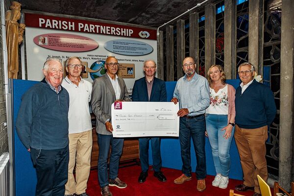 A cheque for €7,000 being presented to representatives of the Ishiara Parish Partnership. Pic: Katerina Siviene