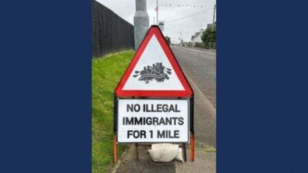 Police remove anti-immigration sign from Co Tyrone village