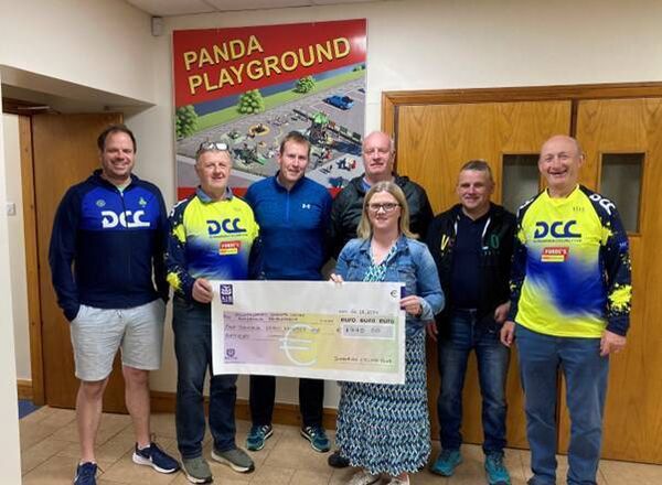 Members of Dungarvan Cycling Club presenting the proceeds of the ‘Comeragh &amp; Knockmealdown Challenge Cycle’ to Panda Playground Committee members.