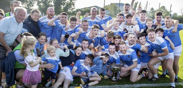 Roanmore celebrate their victory over Kilrossanty in the Co.Junior A Hurling final in Fraher Field. 