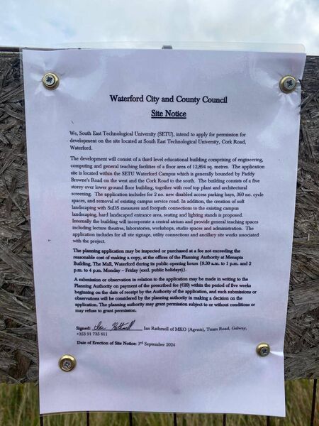 A site notice erected at SETU for the development of an engineering building at the college. A current planning application, granted permission in 2019, will become out of date in December 2024.