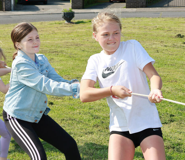  Taking part in the Tug-O-War competition.
