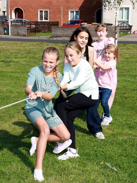  Taking part in the Tug-O-War competition.