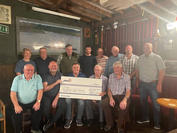 Presentation of cheque to Pieta House from Kilmeaden Vintage Tractor Club.