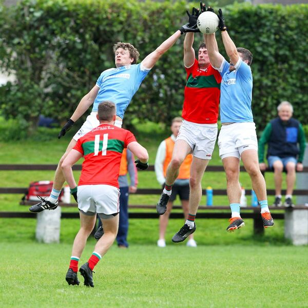 A midfield battle for possession between Roanmore and Clashmore/Kinsalebeg 