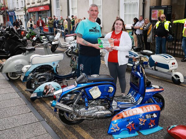 Damien Nolan presented the Best in Show award to Kelly Lawlor, at the Phoenix Yard Market/Kickstart Scooter Club, Custom and Classic Scooter Show. Photo: Joe Evans