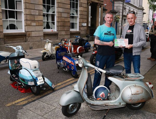 Damien Nolan presented the Best Original award to Warren Doyle, at the Phoenix Yard Market/Kickstart Scooter Club, Custom and Classic Scooter Show. Photo: Joe Evans