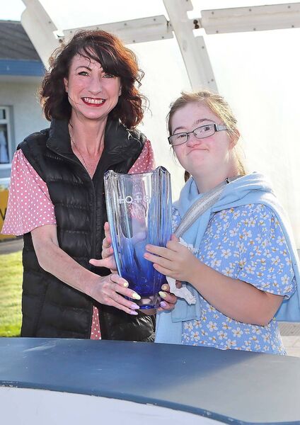  Kimmy Mullins accepted the winners prize from Maeve Leahy, Tote.ie after the Tom Mullins trained C'est Rien ridden by Danny Mullins won the Free Streaming All Racing At Tote.ie Handicap Steeplechase.