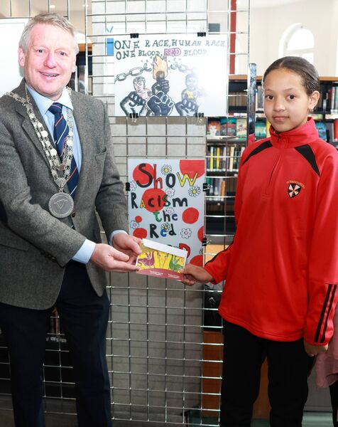 Mayor of Waterford City &amp; County Cllr Jason Murphy presented Sophia of St Saviour's NS with her award. 	All Photos: Joe Evans