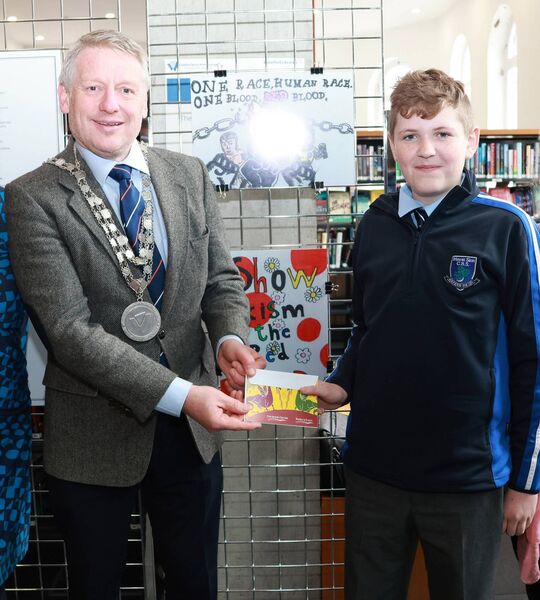 Mayor Cllr Jason Murphy presented Dominic of St Saviour's NS with his award.