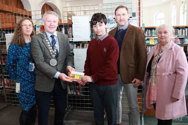 Mayor Cllr Jason Murphy presented Kristian of De La Salle College with his award, also included are Sinead Cummins, Librarian, John McCarren (father) and Ann Nolan, Waterford Integration Services.