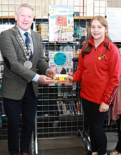 Mayor Cllr Jason Murphy presented Emily of St Saviour's NS with her award, at the Awards Ceremony for the “Making Racism History” schools’ competition. Photo: Joe Evans