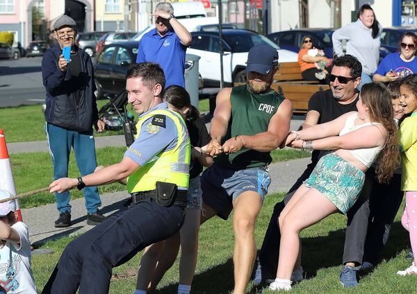 Tug of War on Ballybricken Green during the Playful Streets event.