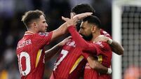Liverpool go top of the Premier League after win at Wolves