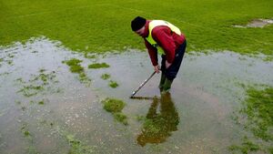 Status Orange rain warning forces sporting cancellations