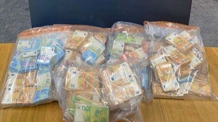 Three people arrested after seizure of €390,000 in Dublin and Portlaoise