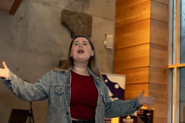Actress Evie Burke playing a scene from Dress You Up at the Imagine Arts Festival Launch. 