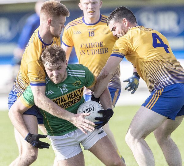 Kilrossanty's Donal Fitzgerald is tackled by Nire's Sean Walsh. Kilrossanty's Donal Fitzgerald is tackled by Nire's Sean Walsh.