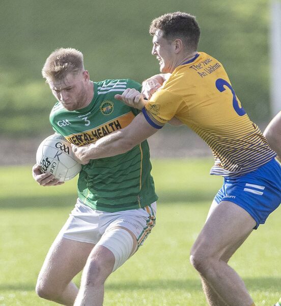 Kilrossanty's Caoimhin Walsh is tackled by Nire's Fionn Hallinan. Kilrossanty's Caoimhin Walsh is tackled by Nire's Fionn Hallinan.