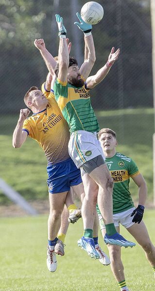 Kilrossanty's Tommy Prendergast in an aerial contest with Nire's Dermot Ryan and Sean Walsh. Kilrossanty's Tommy Prendergast in an aerial contest with Nire's Dermot Ryan and Sean Walsh.