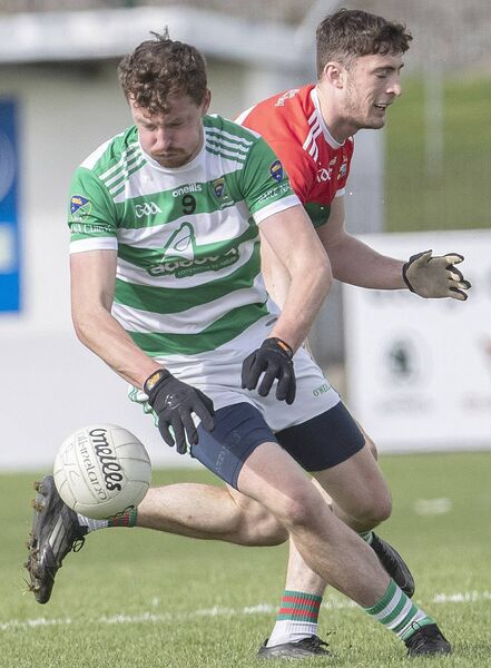 Ballinacourty's James Beresford in action with Clashmoire/Kinsalebeg's Josh Fitzgerald. Ballinacourty's James Beresford in action with Clashmoire/Kinsalebeg's Josh Fitzgerald.