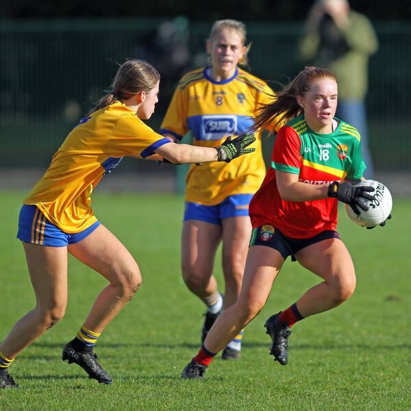 Caoimhe Hassett has goal in her sights as she darts through the Erins Own defence Caoimhe Hassett has goal in her sights as she darts through the Erins Own defence