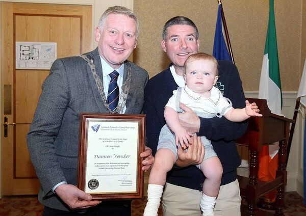 Mayor of Waterford City and County, Cllr Jason Murphy pictured with Damien Vereker and his grandson Archie Doyle at the mayoral reception in recognition of Damien's dedication and outstanding achievements. Photo: Noel Browne