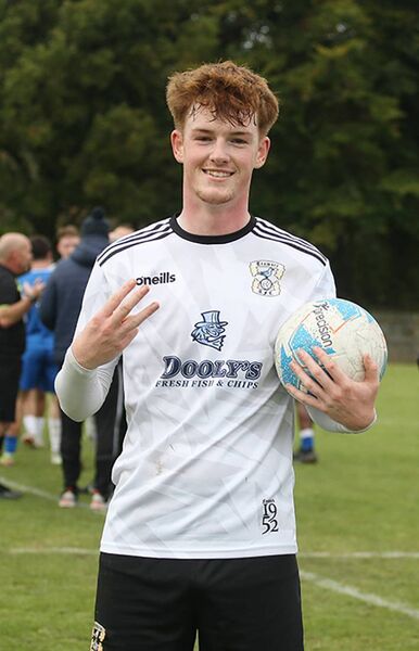 Tramore's Aran O'Brien came off the bench to score a brilliant hat-trick in his side's comeback win over Hibernians in the FAI Junior Cup.