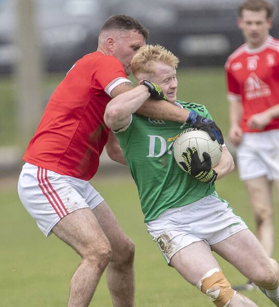 Modeligo's Jamie Power is tackled by Stradbally's Paddy Kiely during the Co.Final of the Cappoquin Logistics sponsored Premier Intermediate Football championship in Lemybrien. Photo Sean Byrne Modeligo's Jamie Power is tackled by Stradbally's Paddy Kiely during the Co.Final of the Cappoquin Logistics sponsored Premier Intermediate Football championship in Lemybrien. Photo Sean Byrne