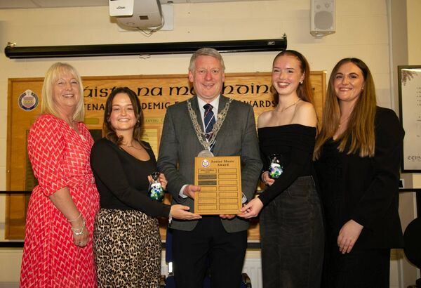 Charley Fitzgerald and Erica Brennan receiving The Senior Music Award. From left: Orla Bolger (Principal), Charley Fitzgerald, Mayor Cllr Jason Murphy, Cara Hayes, Erica Brennan (Music teacher). Photo: John Power