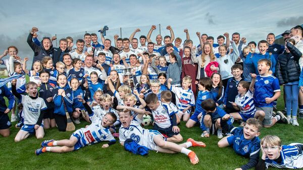 Tramore players and supporters celebrate after victory in the JJ Kavanagh &amp; Sons Co. Intermediate football final played at Walsh Park. Photos: Maurice Hennebry