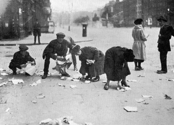 On O’Connell Street Collecting scraps from the aftermath of the explosion in the PROI - Courtesy TCD Library