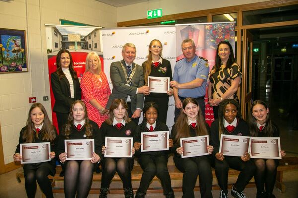 Pictured are agroup of students who received Attendence Certs Back row: From left: Karen O’Neill (Arachas), Sponsers, Orla Bolger (Principal), Mayor Cllr Jason Murphy, Garda David Browne, Karen Coffey (Arachas). Photo: John Power