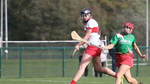 Flynn hits hat-trick as great rivals face off again