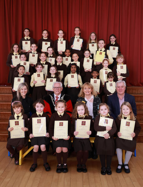  Metropolitan Mayor of Waterford Cllr Joe Kelly, visited St. John of God on his annual school visits and is pictured here with pupils who received hand writing certificates ans also, Avril Hartery, Deputy Principal, Brid Goulding, Principal and Eamon Flynn, Educational Welfare Officer. Photo: Joe Evans