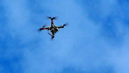 Man hit by fallen drone propeller while mowing lawn, investigators told