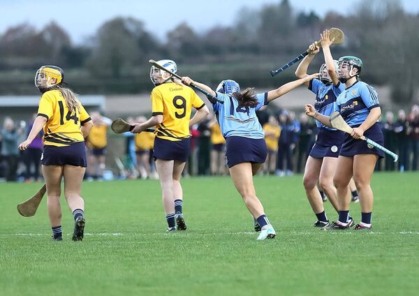 Gailltir's Mollie Comerford wheels away to celebrate her game saving point in the dying seconds of the game to earn her side a replay. 