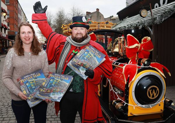 Mary Frances Ryan, Editor, Waterford News &amp; Star, showing the Festive Star to Winterval train driver Jamie Drohan. Photo: Joe Evans
