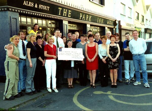 Customers from the Park Inn/Bad Bobs watching the committee present a cheque to Sister Joyce Collinane , Leukemia Truse-in association with the Old Rogue having raised £6,374.37 from the second Annual Charity Swim in memory of Peter 'Pinky'O'Rourke.Also in picture are Marie Ryan, Mary Culleton and Ger Hearne with members of Peter's Family back in 1999.